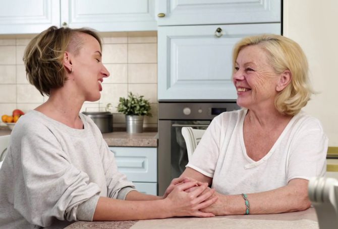 caregiver-holding-hands-with-patient